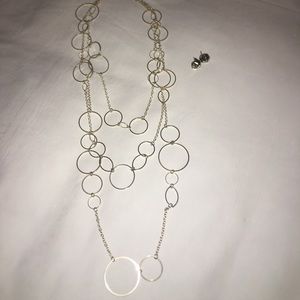 Silver layered necklace with knotted stud earrings
